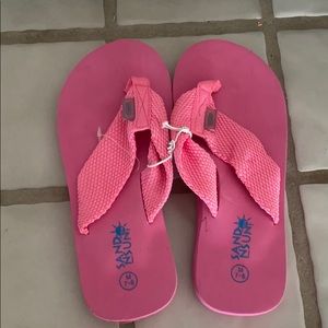 Hot pink flip flops